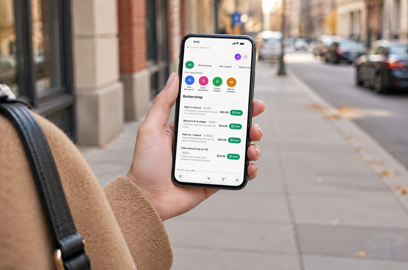 A client on the street opens the salon booking page on her phone to take a free slot