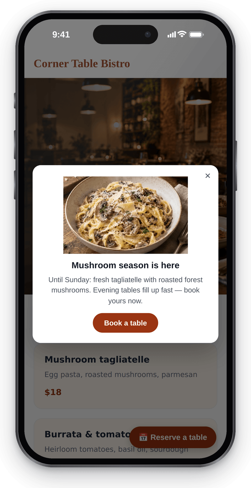 The same promo popup on a visitor’s phone: a card over the bistro page with a booking button